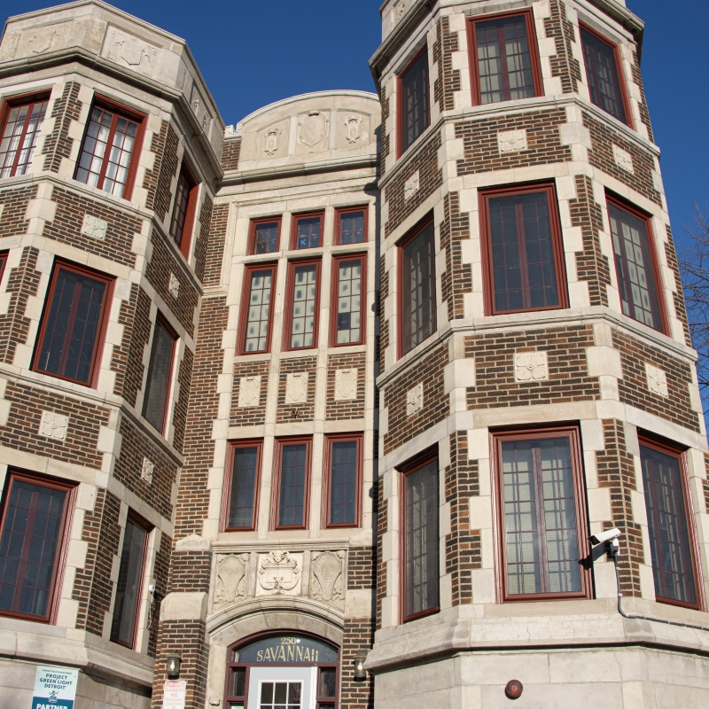 A beautiful older apartment complex with two towers
