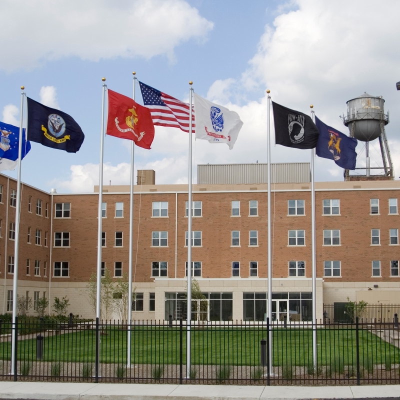 Building with flags in the front of it