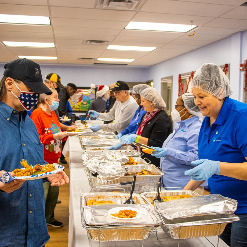 Volunteers serving lunch